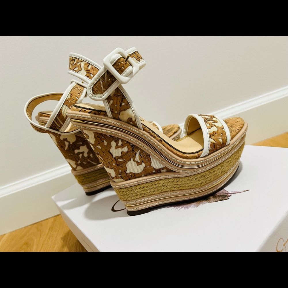 Women’s Ayala Wedge Sandals : light wear at soles,some discoloration on stripes.